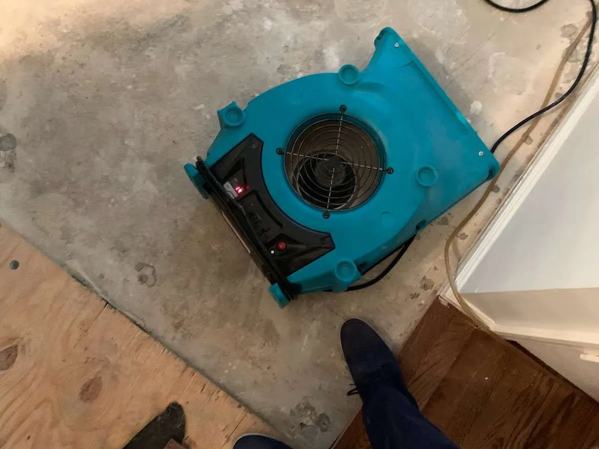 Air mover drying subfloor during Leak Detection & Repair in Napa